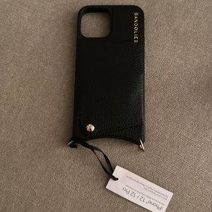 Bandolier phone holder. Strap is not included.